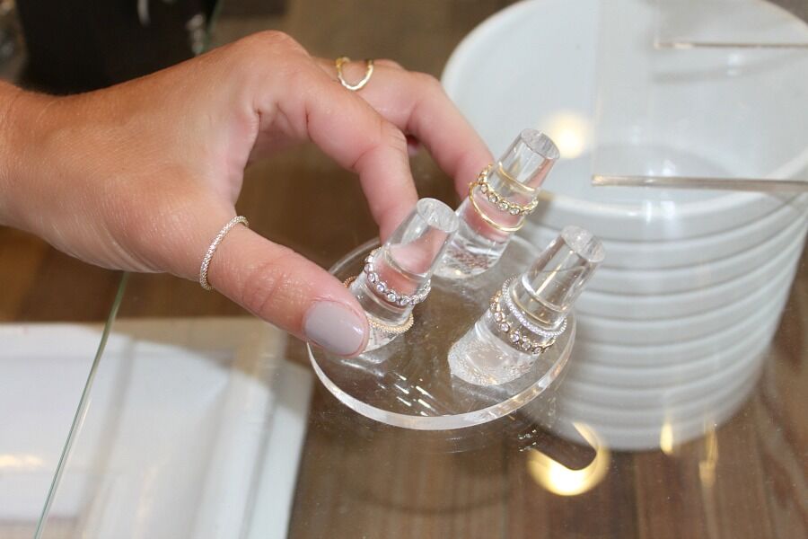 Close-up of dainty rings on display