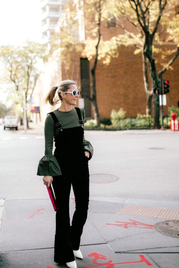 woman Wearing Velvet Overalls for the Holidays