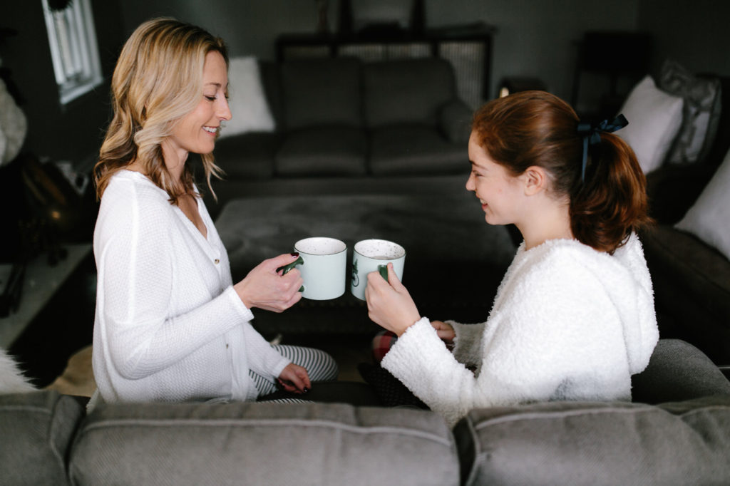 mom and daughter sharing gift guide for teenagers