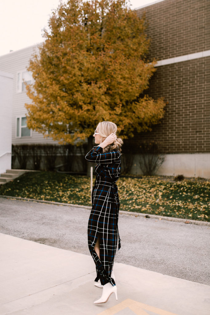 woman walking and holding hair