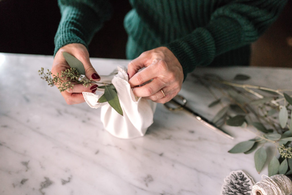 Attach a gift tag with some ribbon around the tie