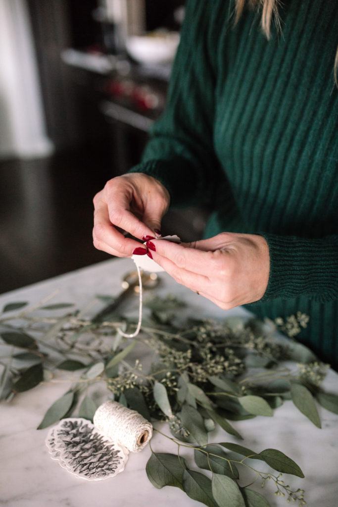 Attach a gift tag with some ribbon around the tie