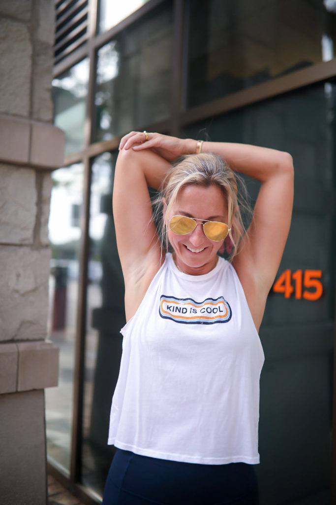 a woman in a shirt that says kind is cool